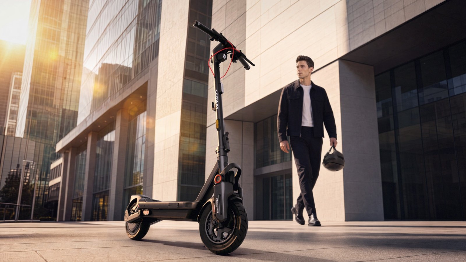 max-g3-pro-e-d-man-walking-with-helmet-towards-ekickscooter